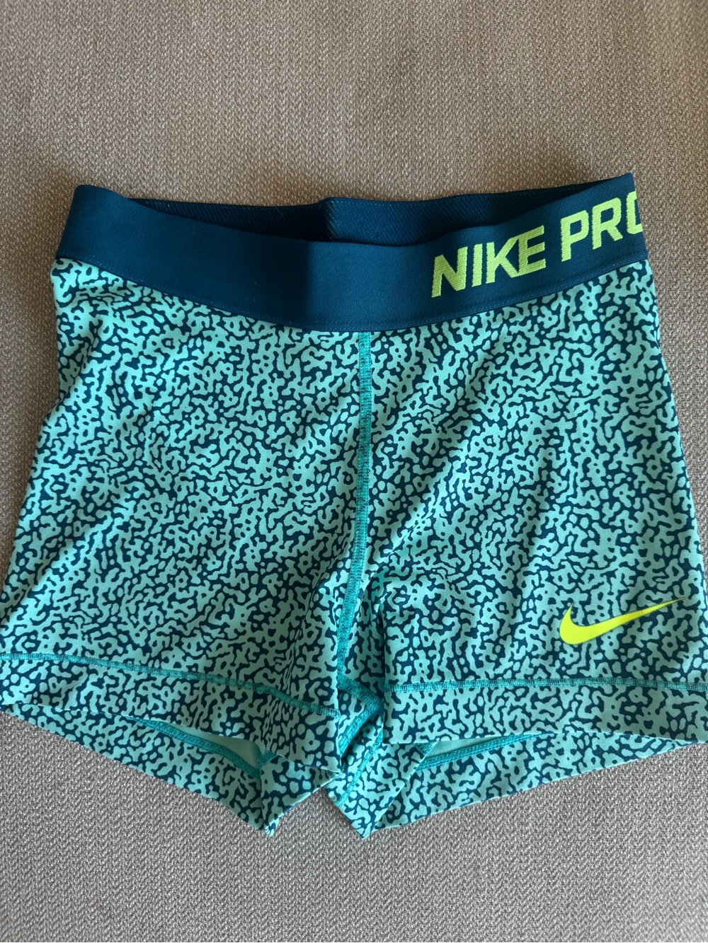 Nike Women’s Turquoise Print Pro Shorts with Neon Yellow Logo